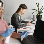 Comprehensive facility management UAE, cleaning services, and HR outsourcing team working together in a UAE commercial building